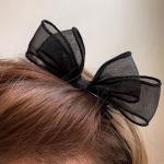 meticulously designed black mesh hairpin features a delicate, sheer design that gives you a feminine look that balances simplicity and elegance.