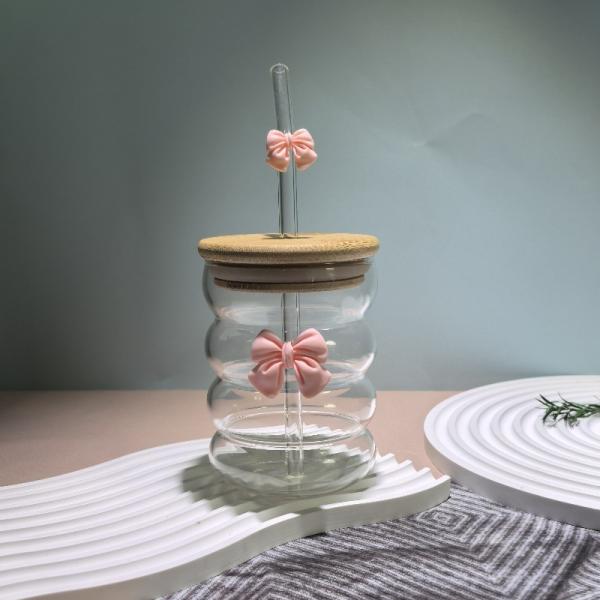 Elegant glass cup with lid and straw